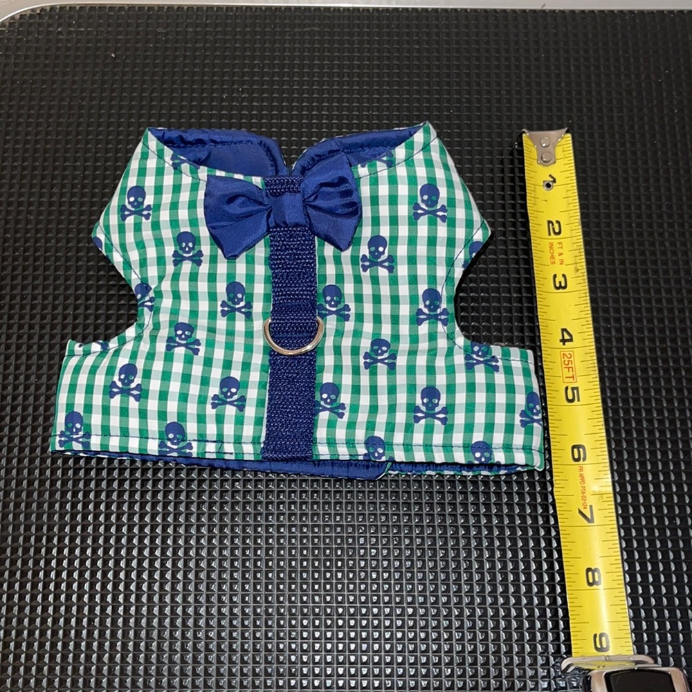 Never used. Male small dog harness. Soft and comfy. Padded lining